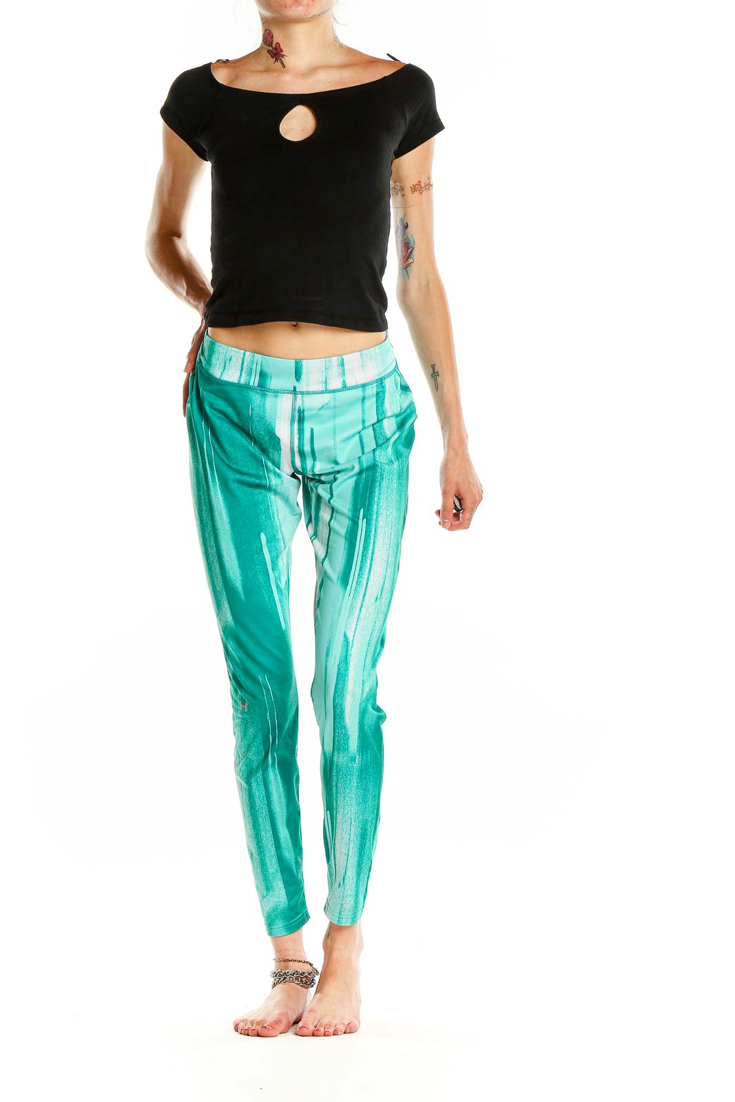 Front view of teal tie-dye Under Armour athletic leggings