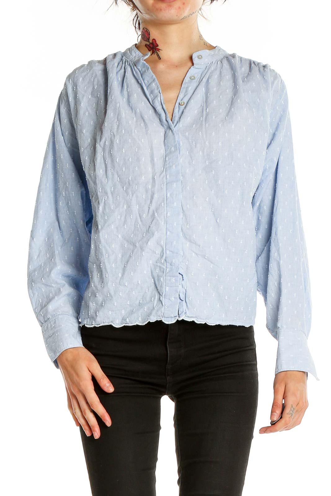 Front view of Joie light blue textured button-up blouse with gathered shoulders