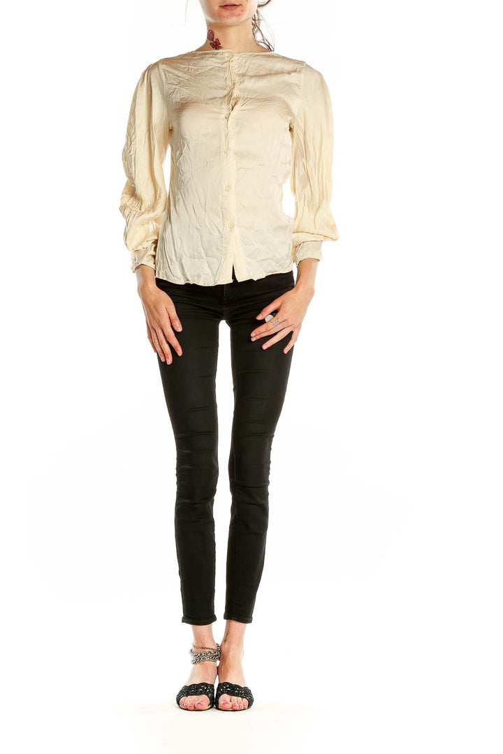 Front view of cream button-up blouse with puff sleeves by Young Fabulous & Broke