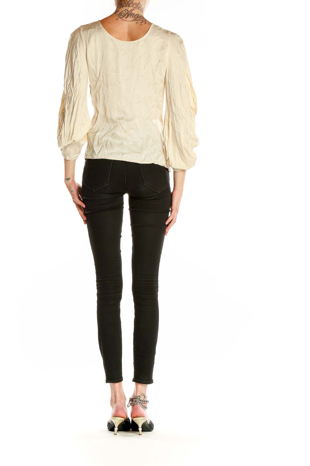 Back view of cream button-up blouse with puff sleeves by Young Fabulous & Broke
