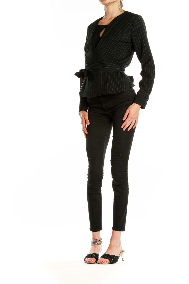 Front view of Rachel Roy Collection black pinstriped wrap blazer