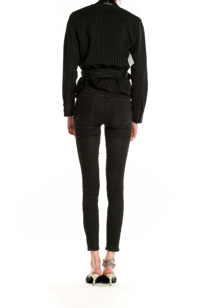 Back view of Rachel Roy Collection black pinstriped wrap blazer with matching trousers