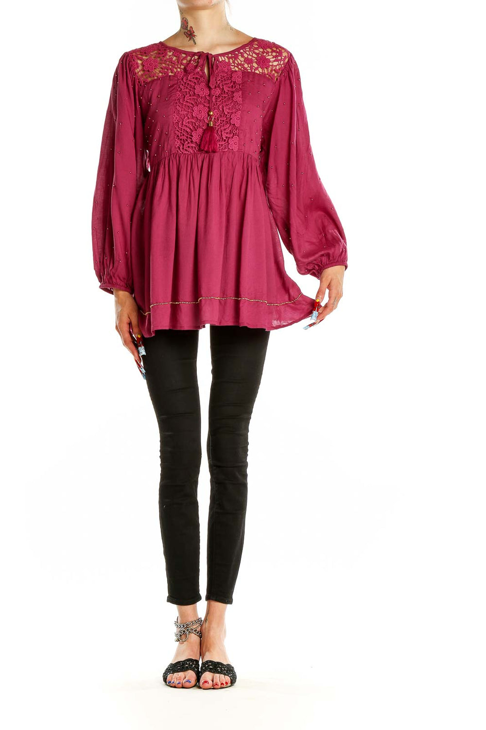 Front view of burgundy Free People tunic top with lace yoke and balloon sleeves