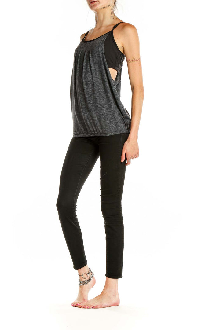 Front view of gray pleated racerback tank top from Beyond Yoga