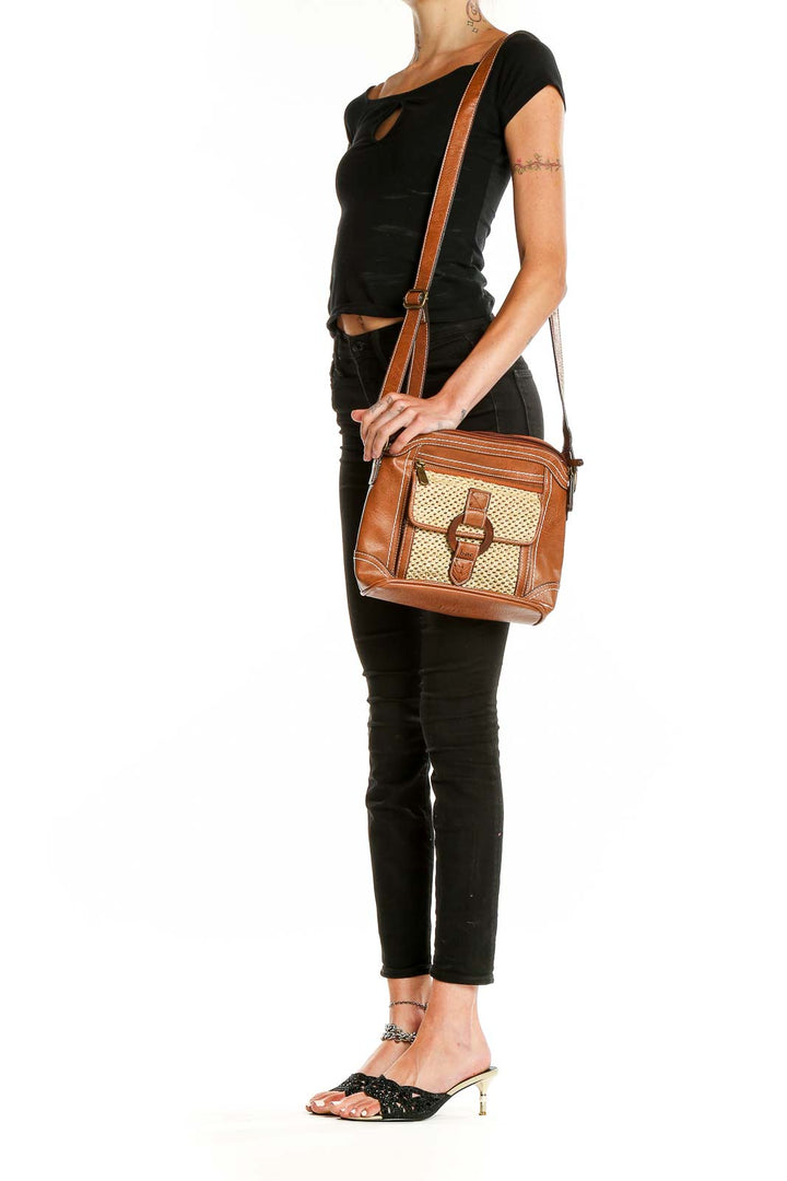 Front view of Born Concepts brown crossbody shoulder bag with woven pocket
