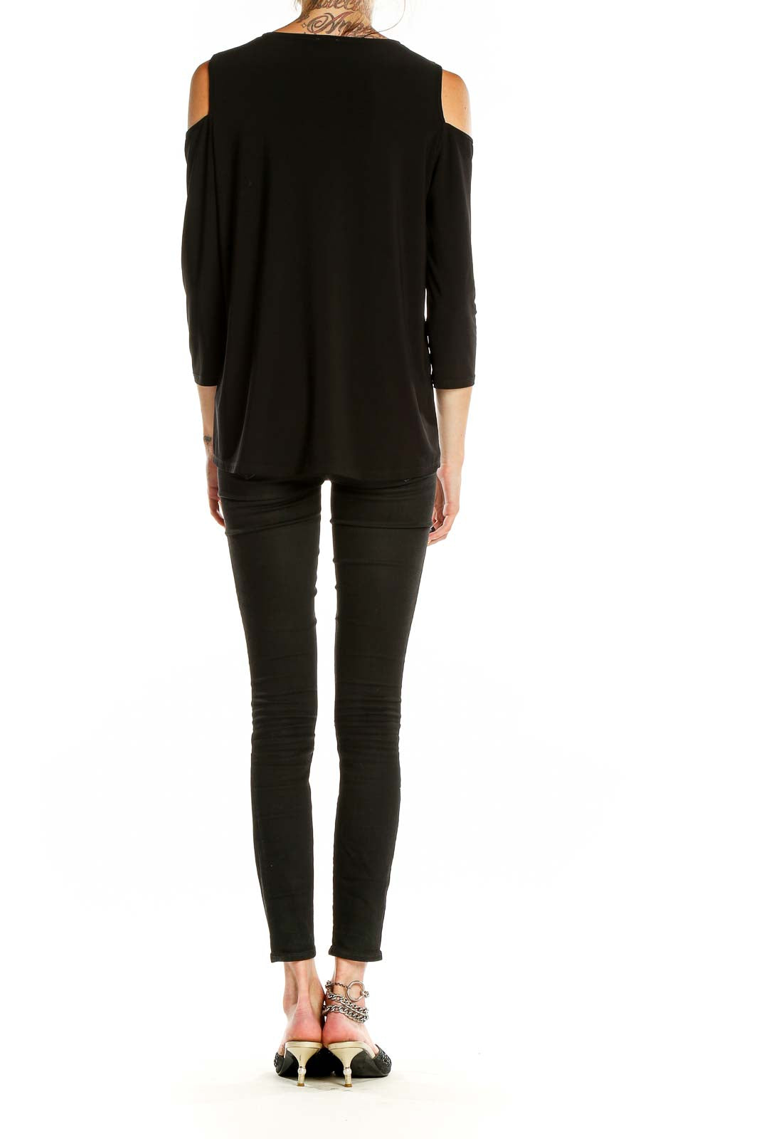 Back view of Anne Klein black cold shoulder top showing sleek design
