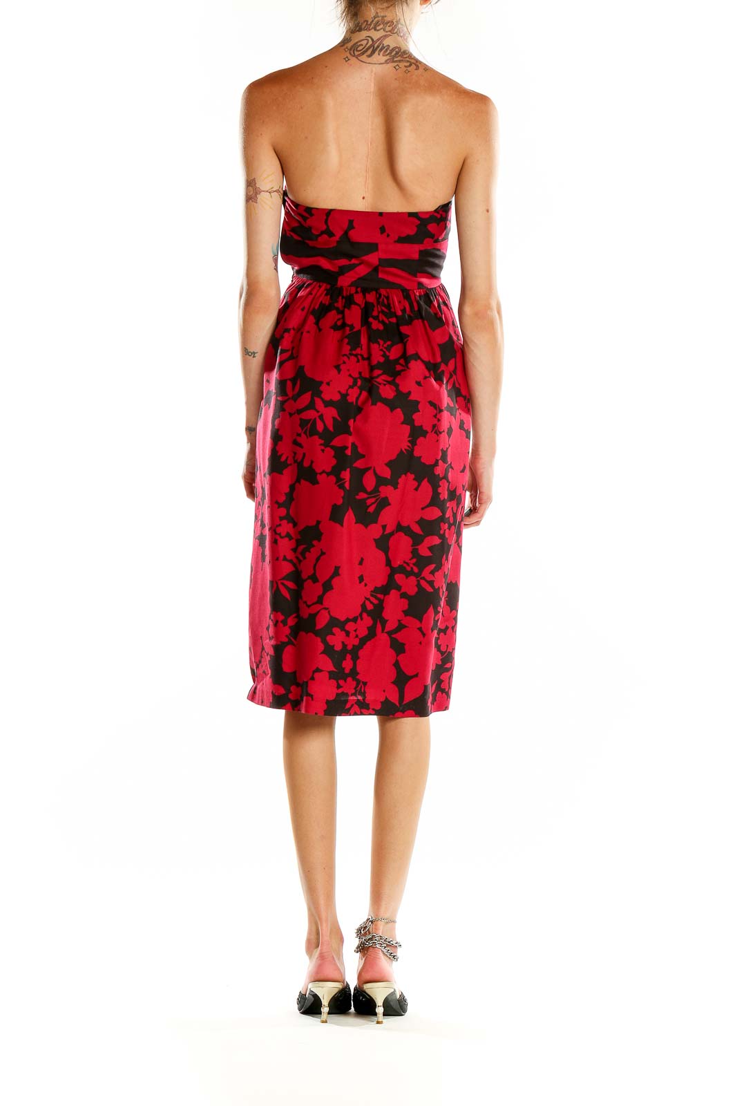 Back view of Tibi New York red floral strapless cocktail dress showing flared skirt