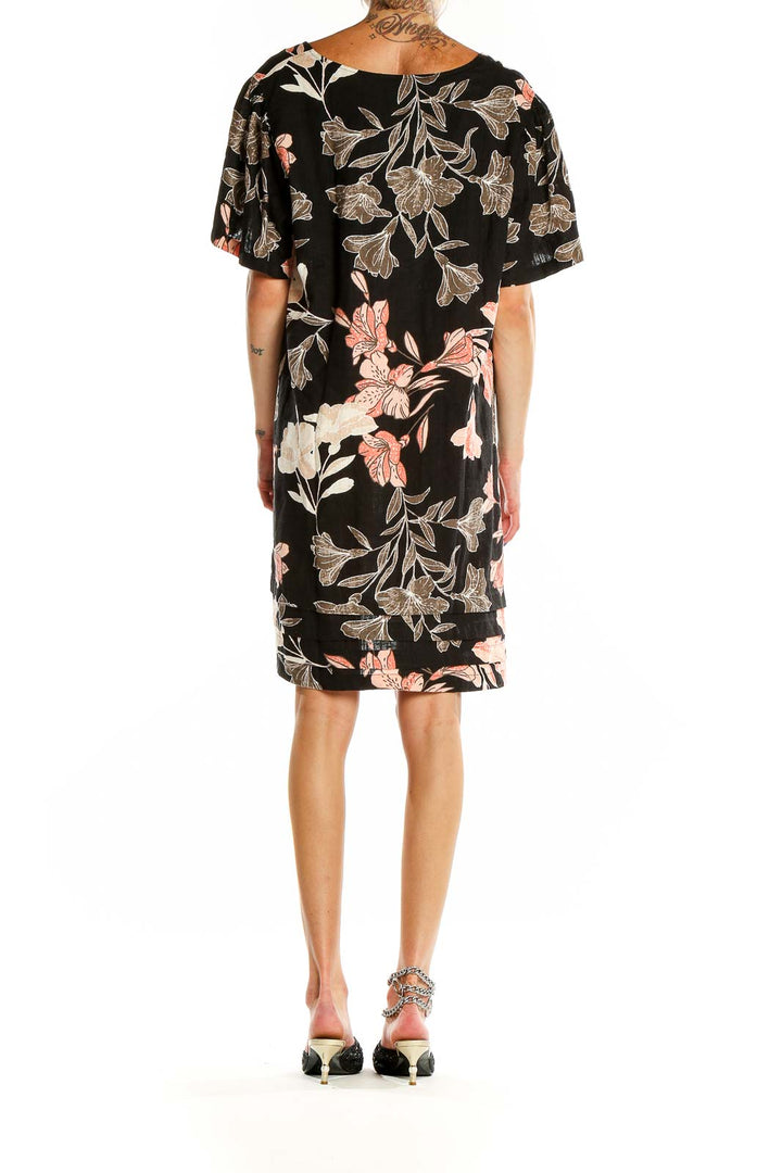Back view of Original Nicole Miller black floral print short sleeve dress