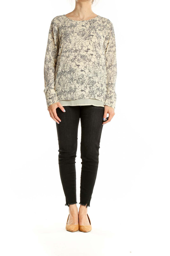 Front view of beige floral print long sleeve blouse from The Limited