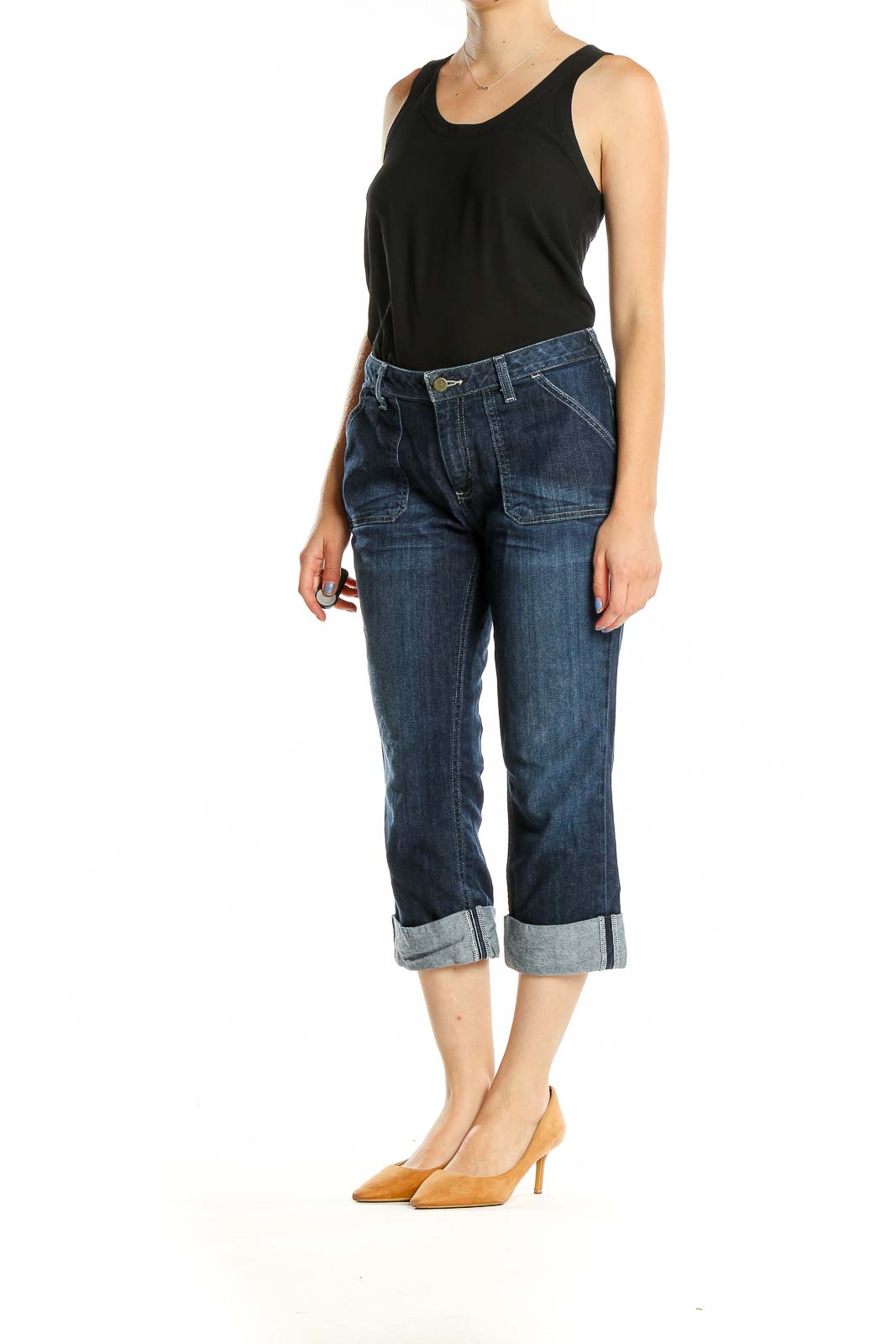 Front view of Carhartt dark blue cuffed capri jeans on model