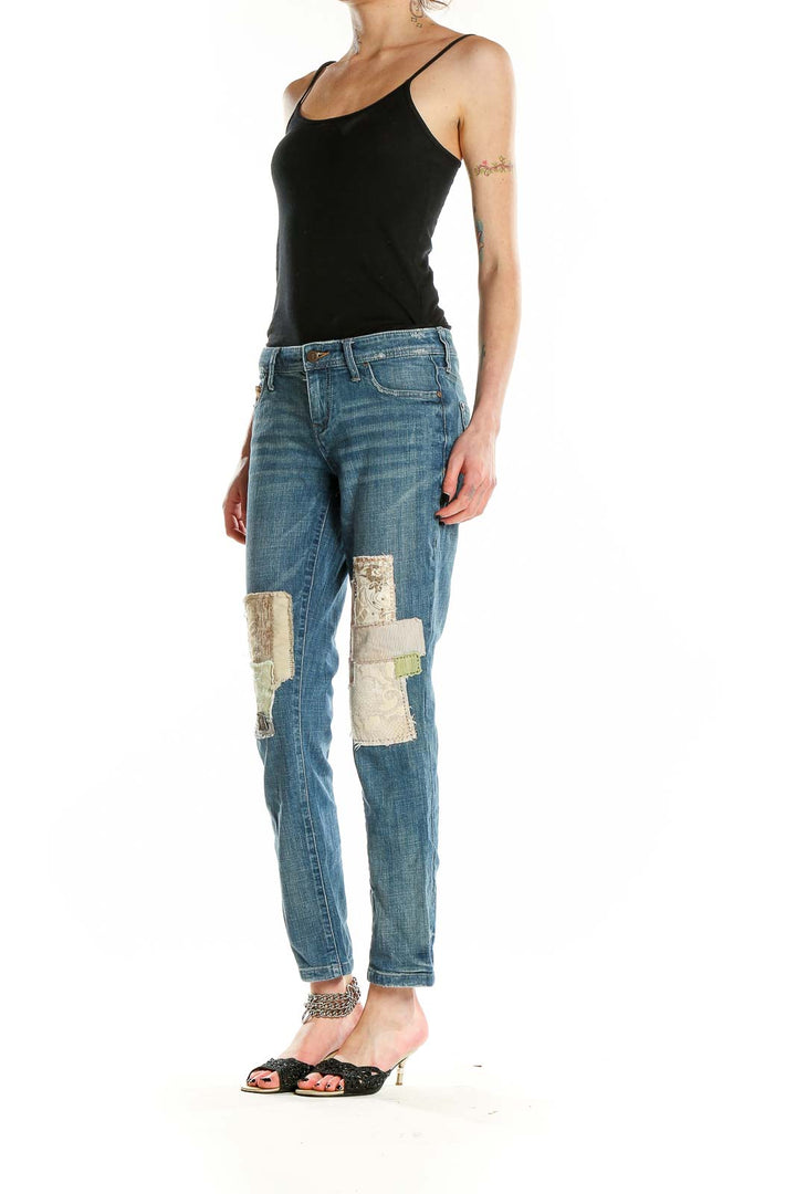 Front view of Pilcro and the Letterpress blue patchwork straight leg jeans