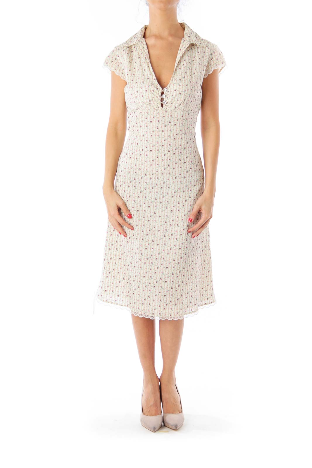 Front view of cream floral print midi dress from Free People with V-neckline and cap sleeves