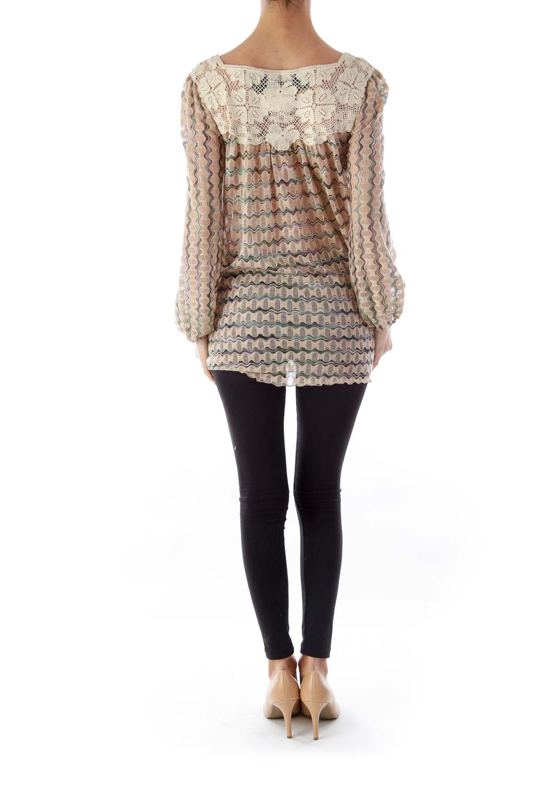 Back view of Free People beige tunic top showing crochet lace detail and flowy fit