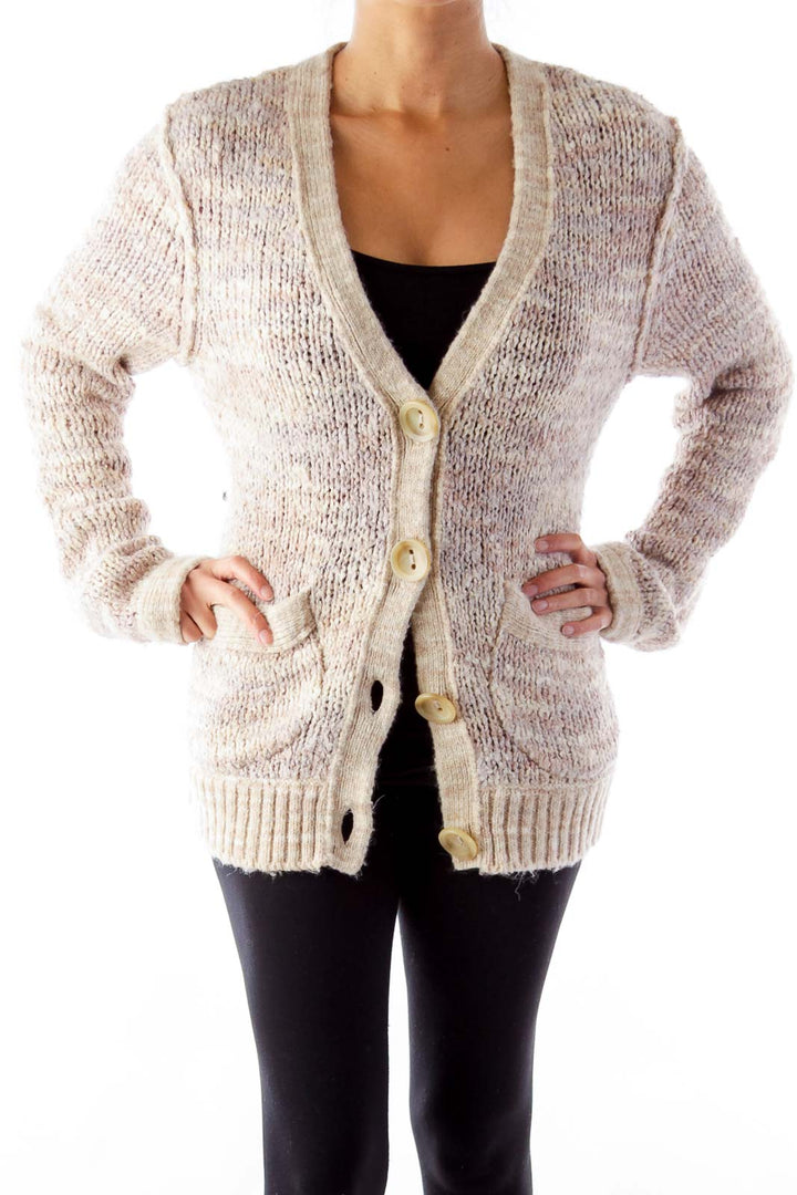 Front view of cream chunky knit button-up cardigan from Free People