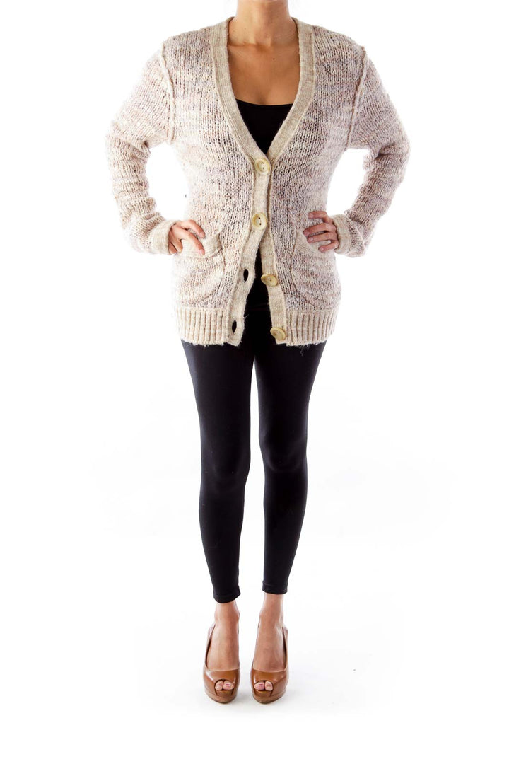 Front view of cream chunky knit button-up cardigan from Free People