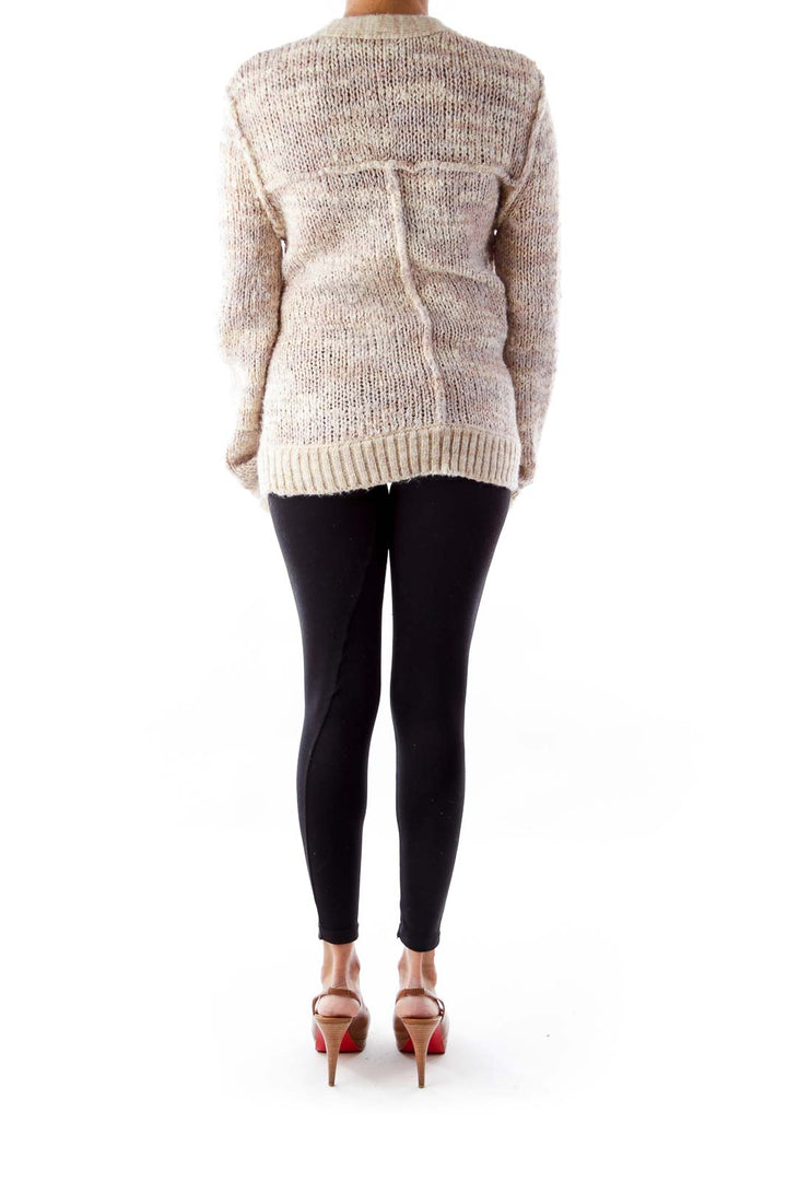 Back view of cream chunky knit button-up cardigan from Free People