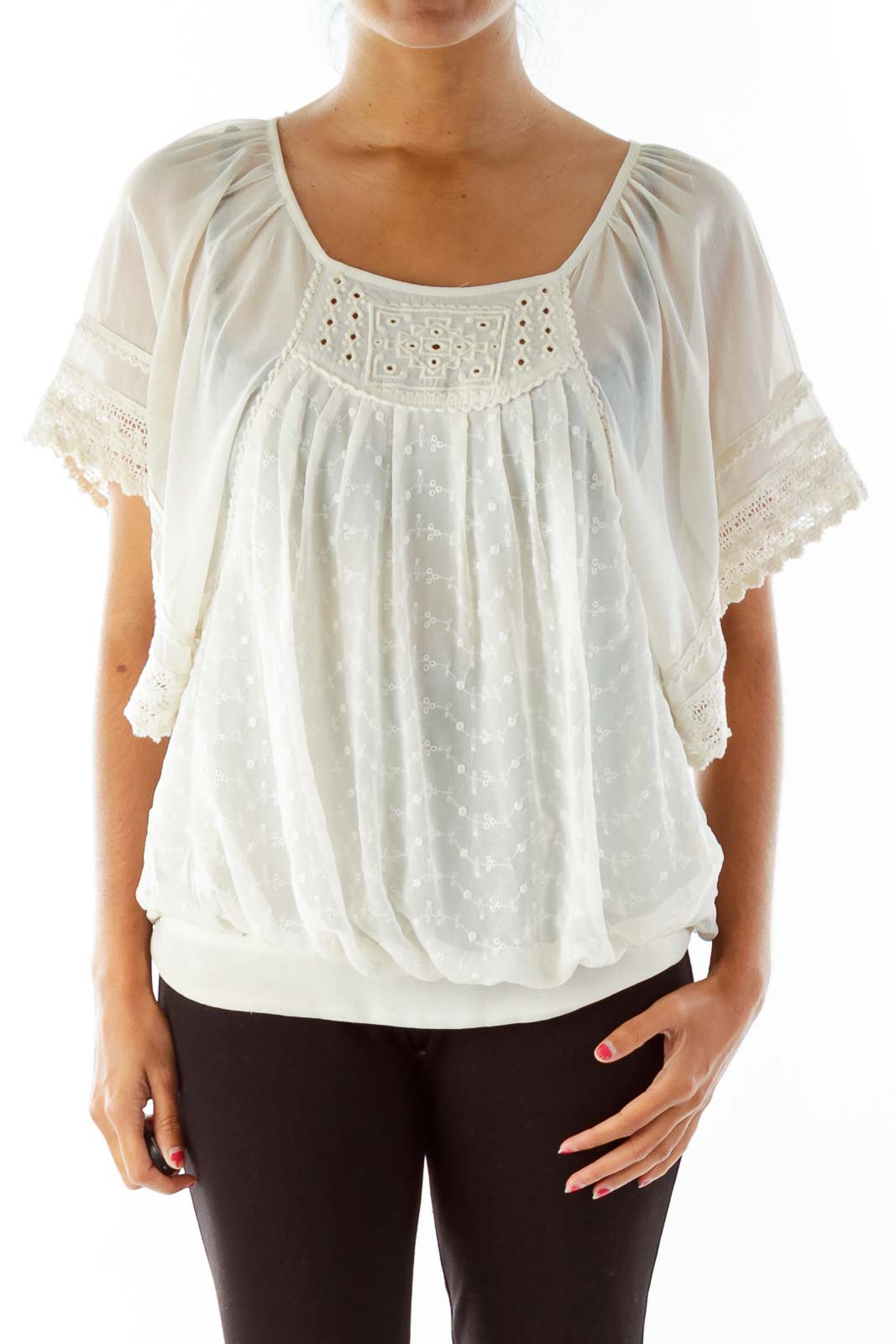 Front view of white eyelet lace peasant blouse from Free People