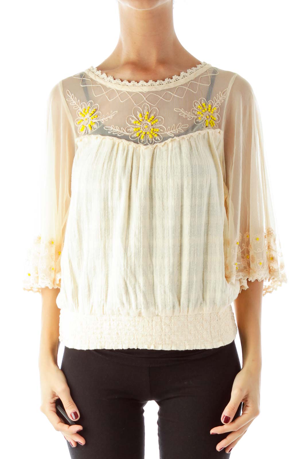 Front view of cream sheer peasant top with yellow floral embroidery and bell sleeves