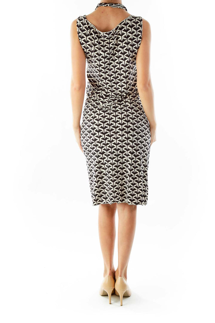 Back view of M.J.J.P. black and white geometric print midi dress showing full pattern