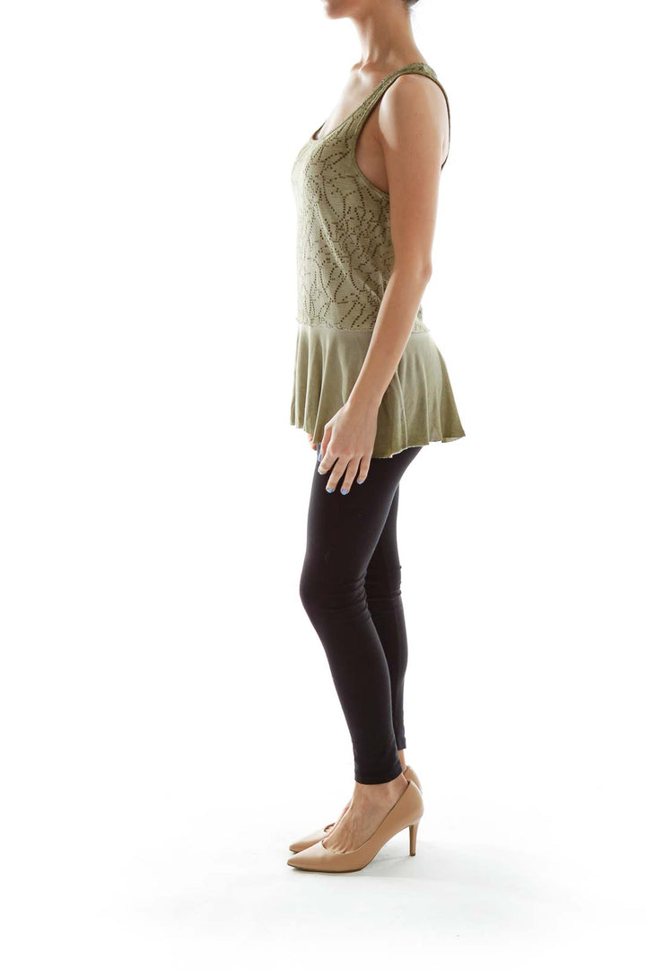 Front view of sage green Free People tank top with lace overlay and peplum hem