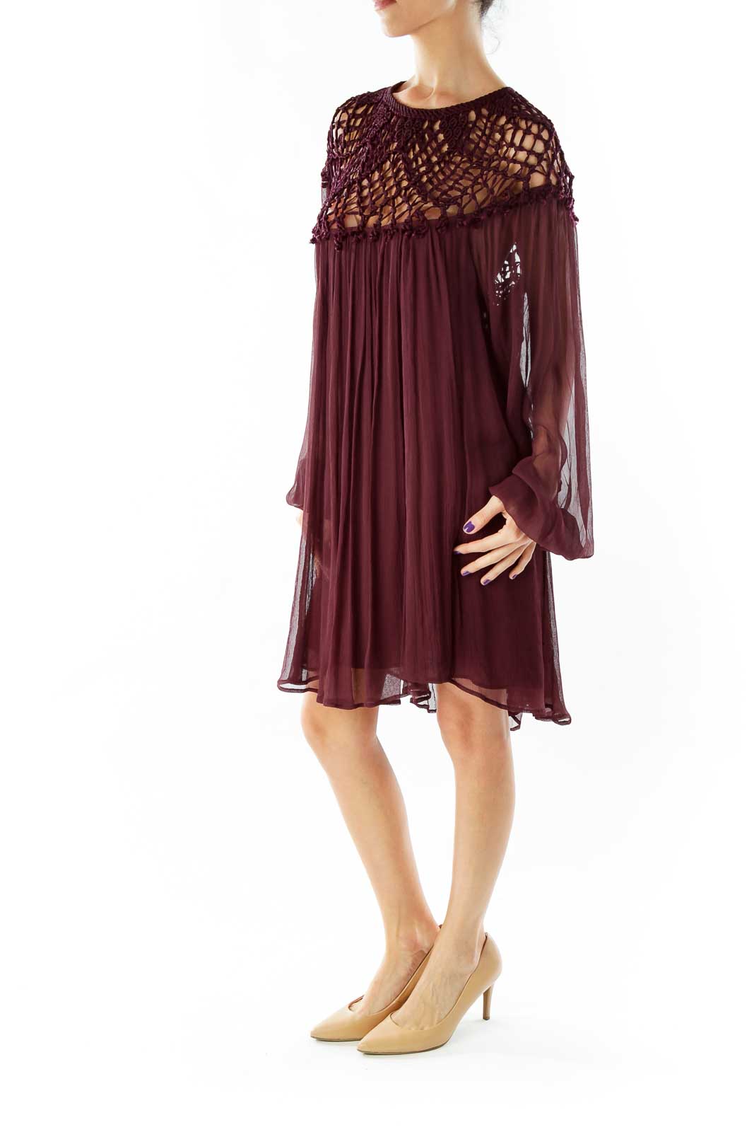 Front view of burgundy Free People dress with crochet yoke and flowy silhouette