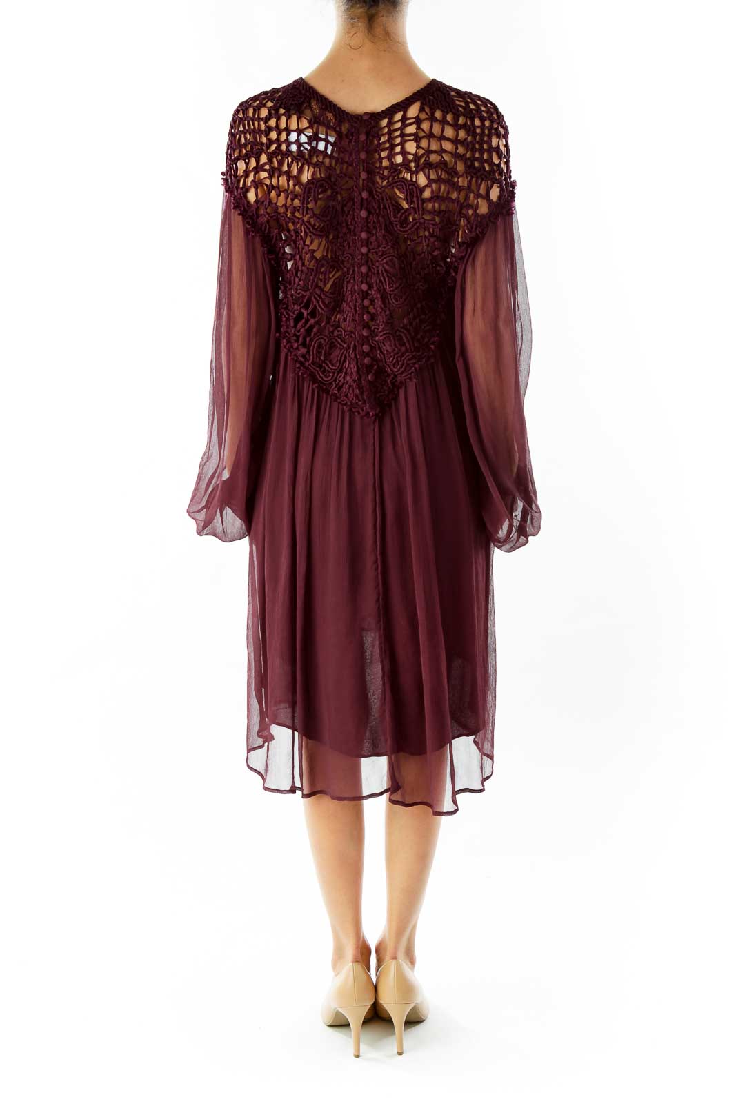 Back view of burgundy Free People dress showing crochet detail and sheer fabric