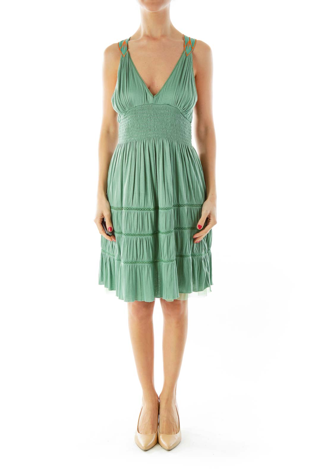 Front view of sage green tiered sundress with V-neckline and spaghetti straps