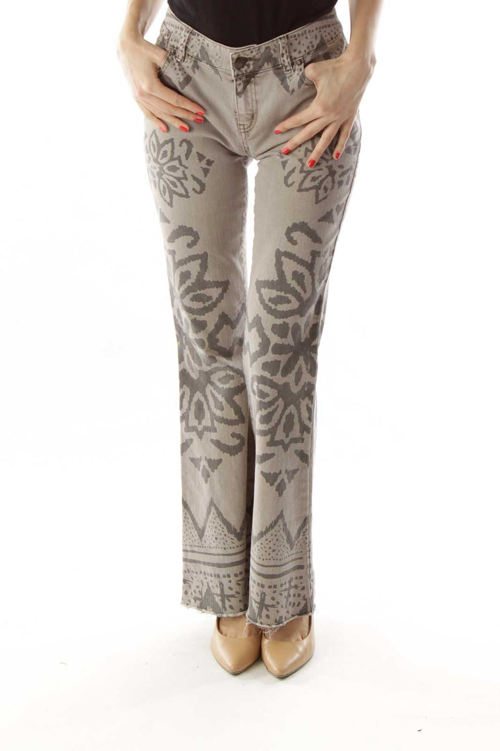 Front view of Free People beige denim jeans with floral embroidery