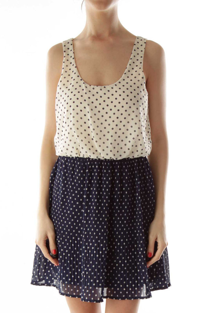 White and Navy Polka-Dot Pleated Dress