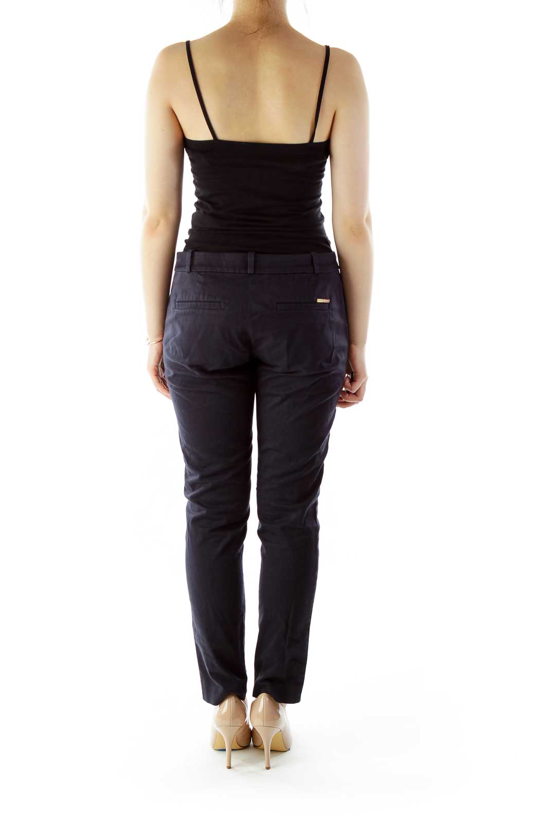 Back view of black MICHAEL Michael Kors slim-fit dress pants on model