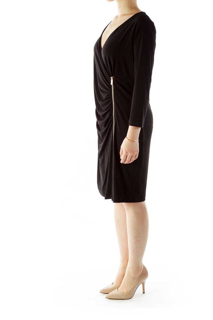 Front view of Calvin Klein black wrap dress with side zipper