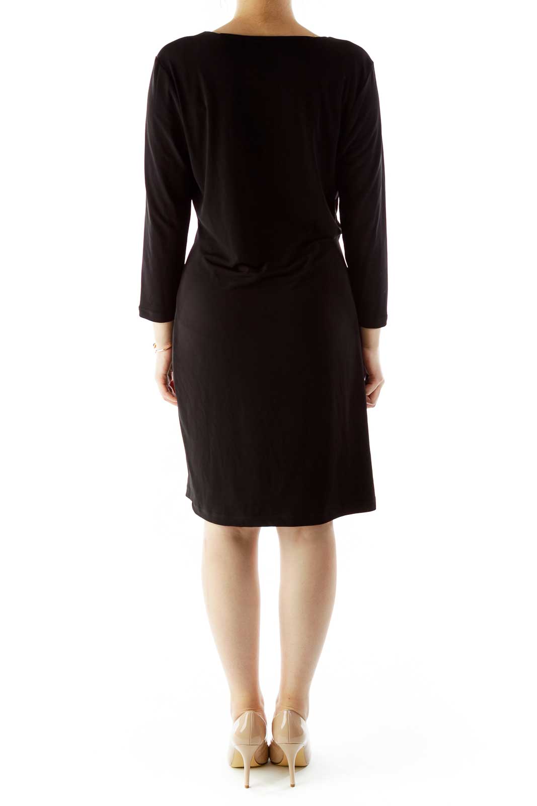 Back view of Calvin Klein black wrap dress showing sleek silhouette