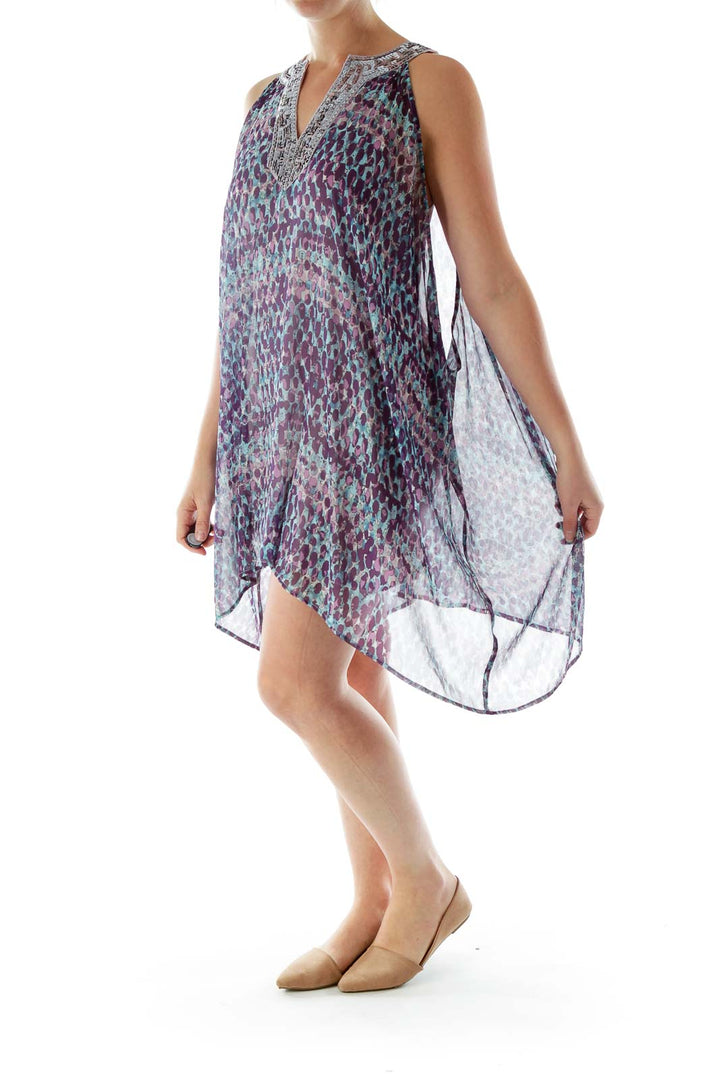 Front view of Free People purple and blue leopard print chiffon dress with beaded V-neckline