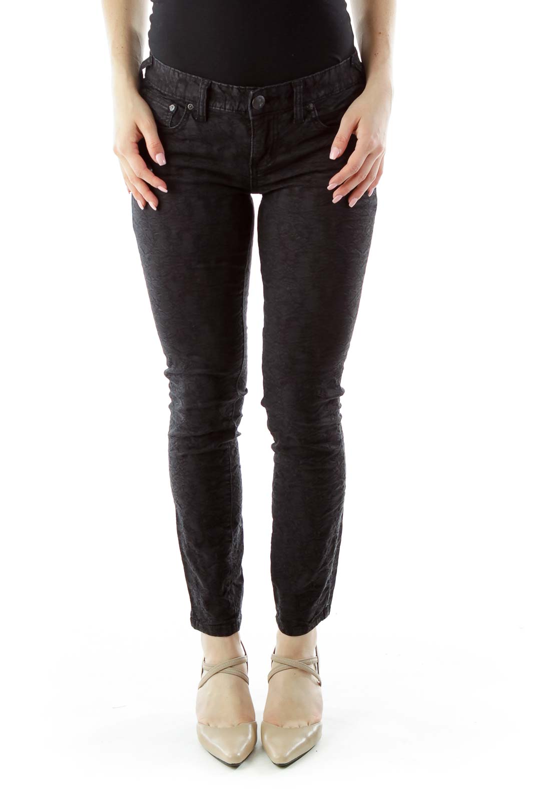 Front view of Free People black textured skinny pants on model