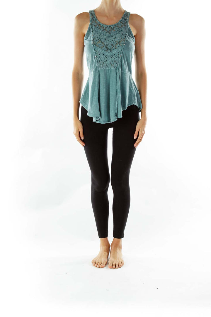 Front view of teal Free People peplum tank top with lace detailing