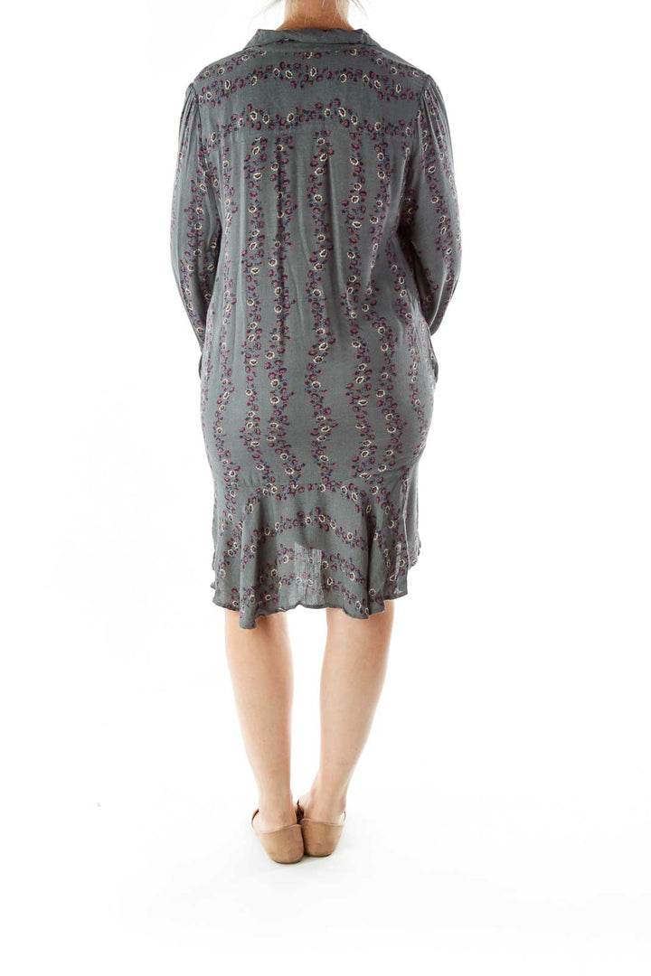 Back view of gray Free People shirt dress showing floral pattern and loose fit