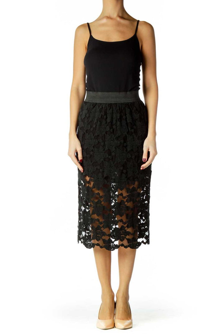 Front view of Free People black lace midi skirt with floral pattern