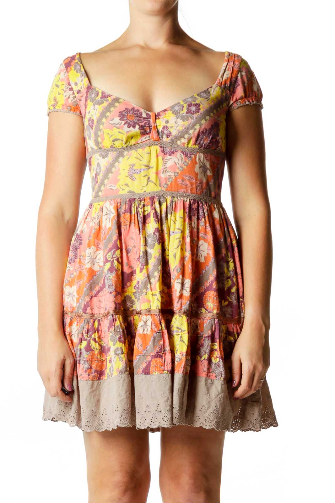 Front view of multicolor floral Free People babydoll mini dress with puff sleeves