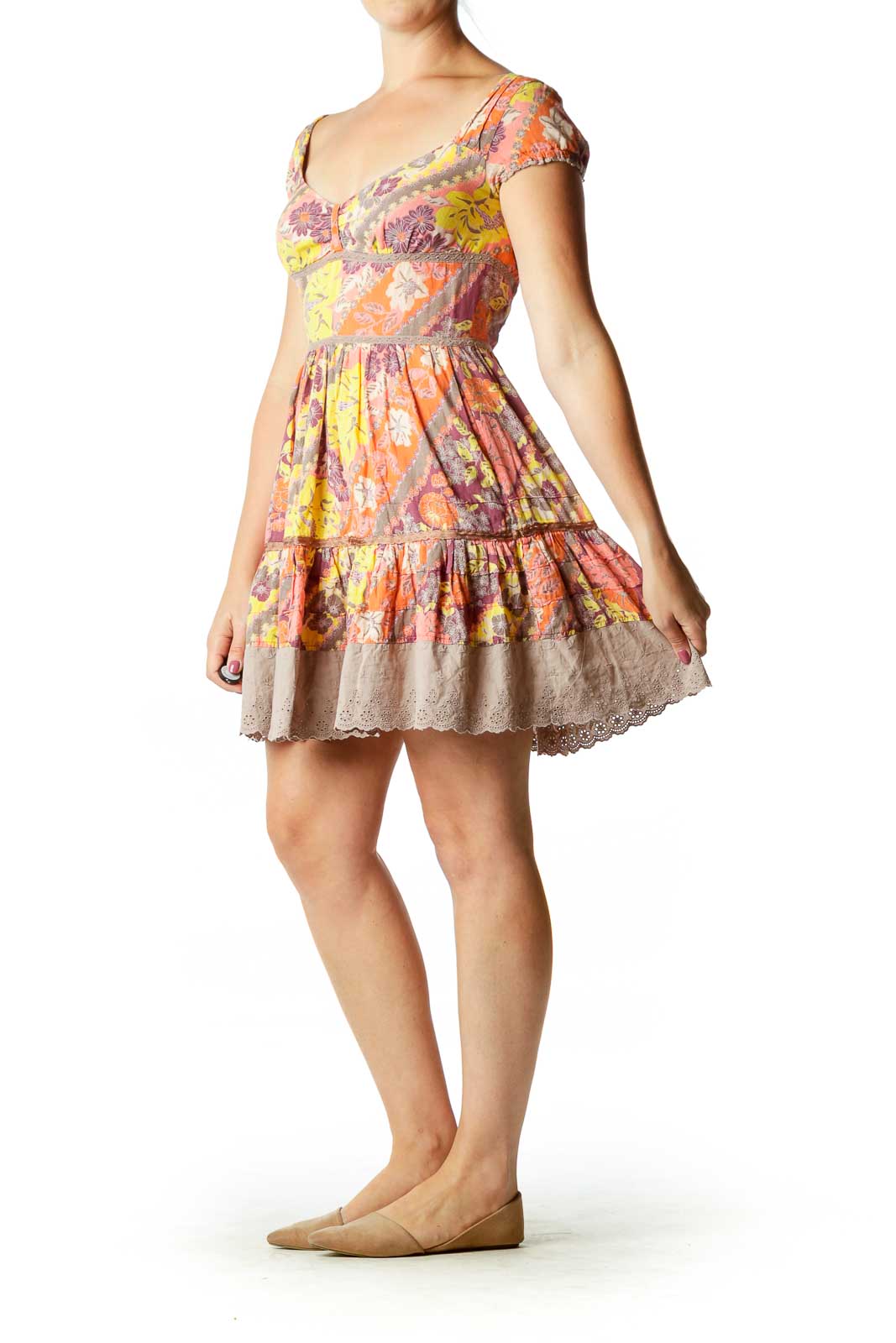 Front view of multicolor floral Free People babydoll mini dress with puff sleeves