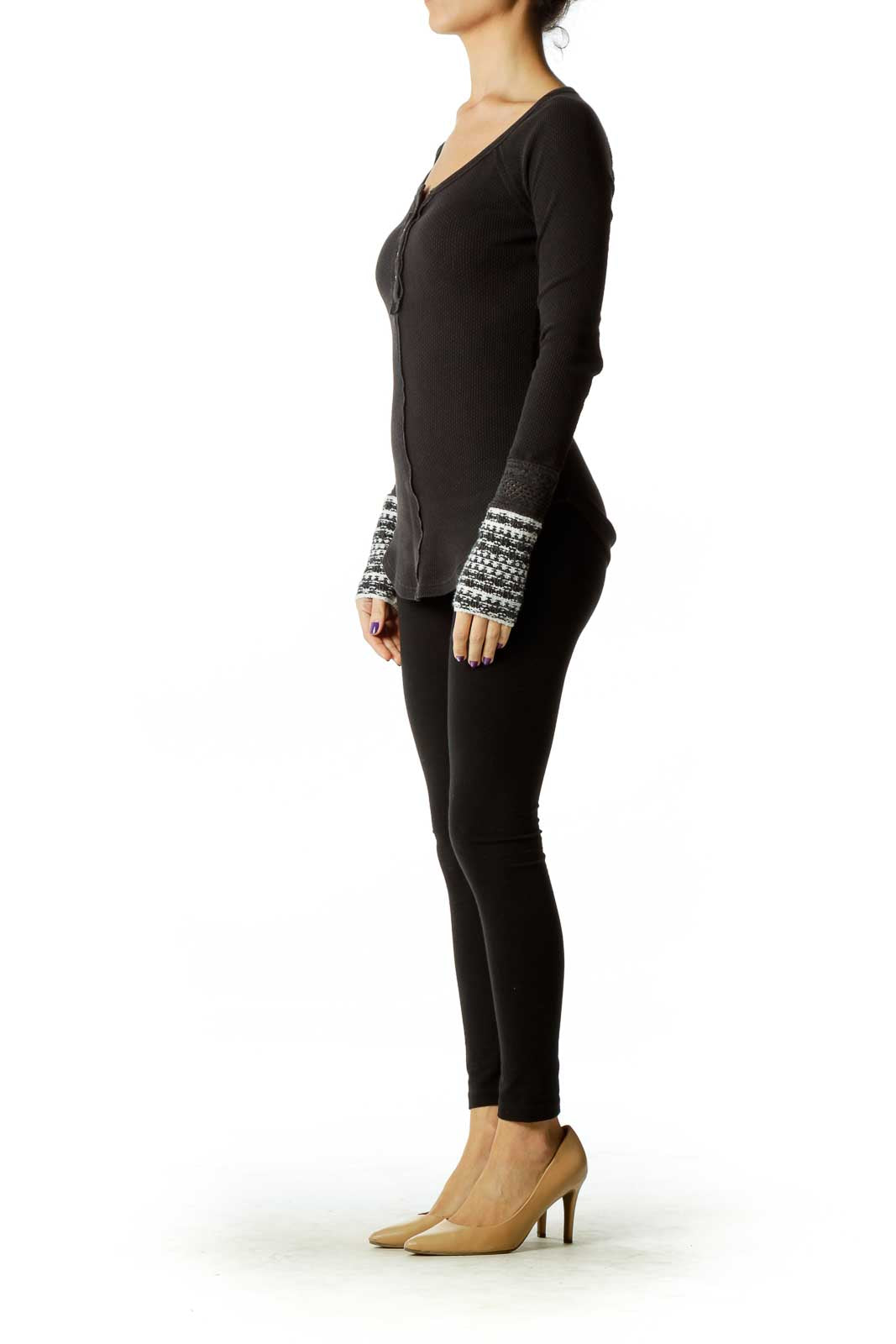 Front view of Free People black thermal henley top with patterned cuffs