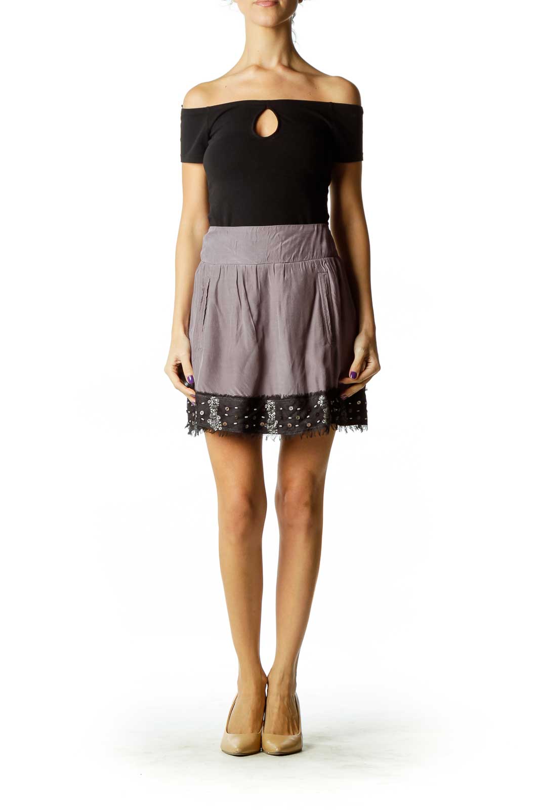 Front view of lavender Free People mini skirt with embellished hem