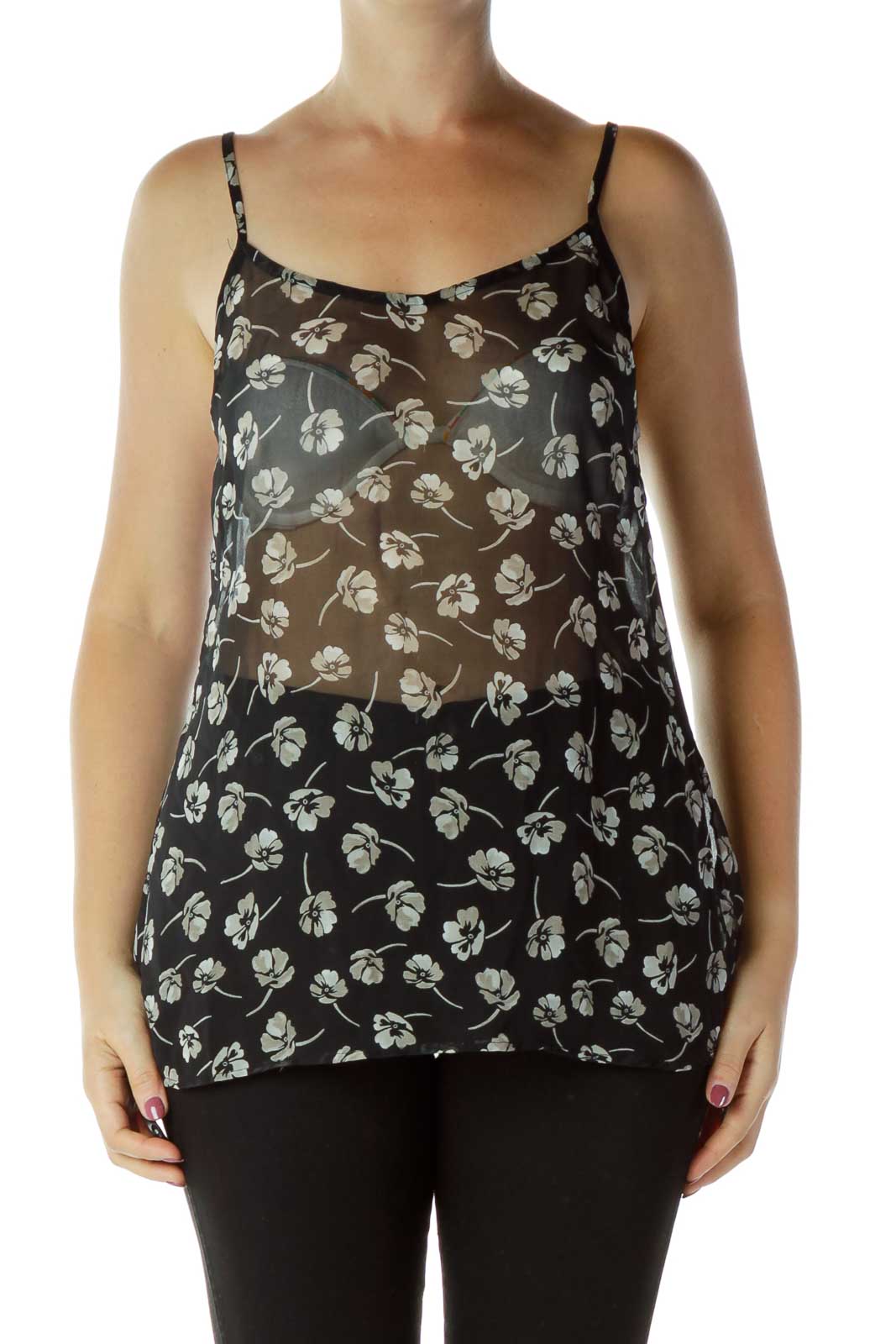 Front view of Free People black camisole top with white floral print