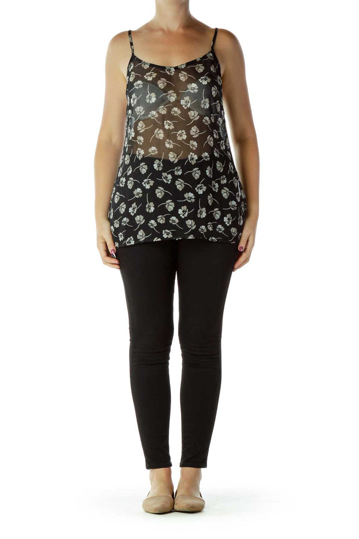 Front view of Free People black camisole top with white floral print