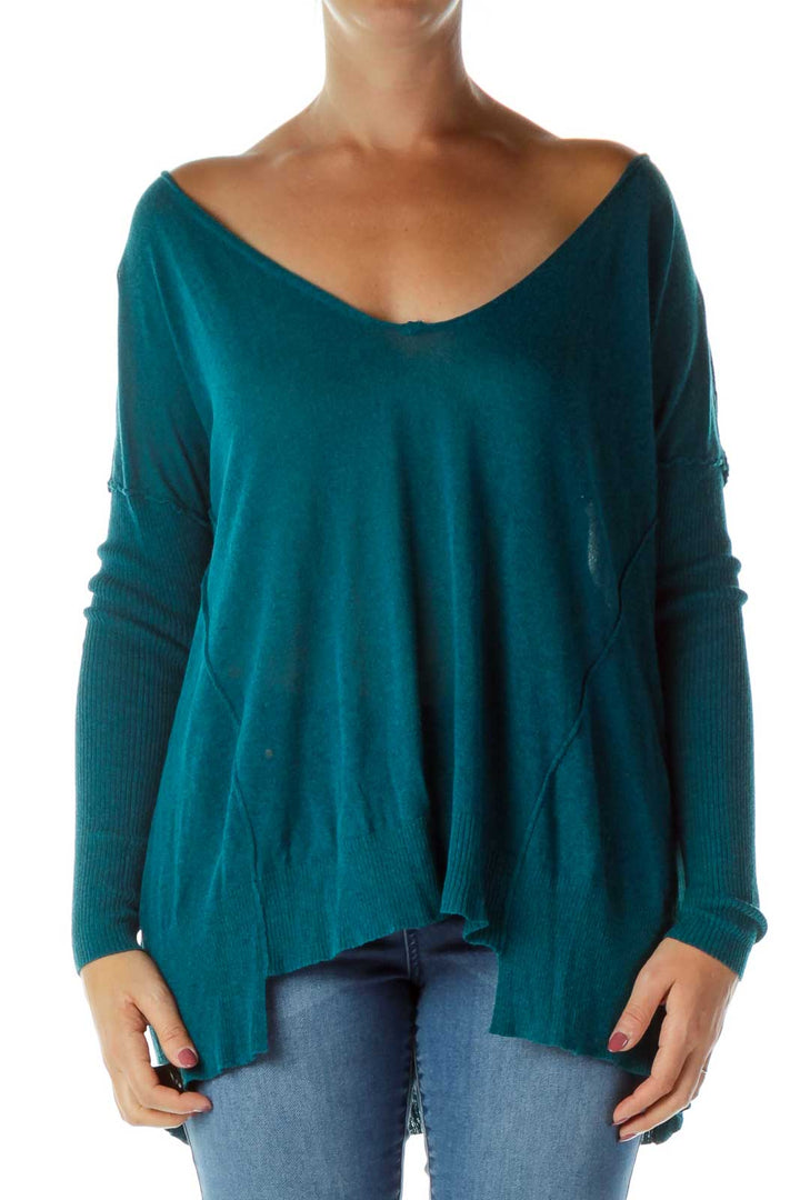 Front view of teal oversized V-neck knit sweater from Free People