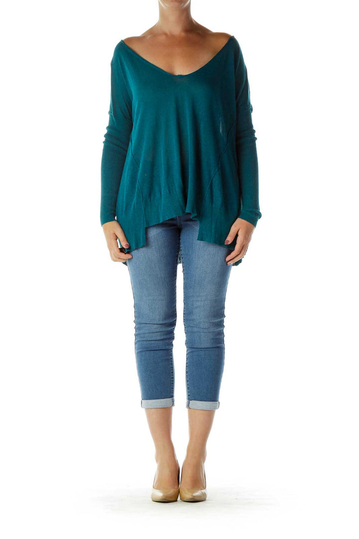 Front view of teal oversized V-neck knit sweater from Free People