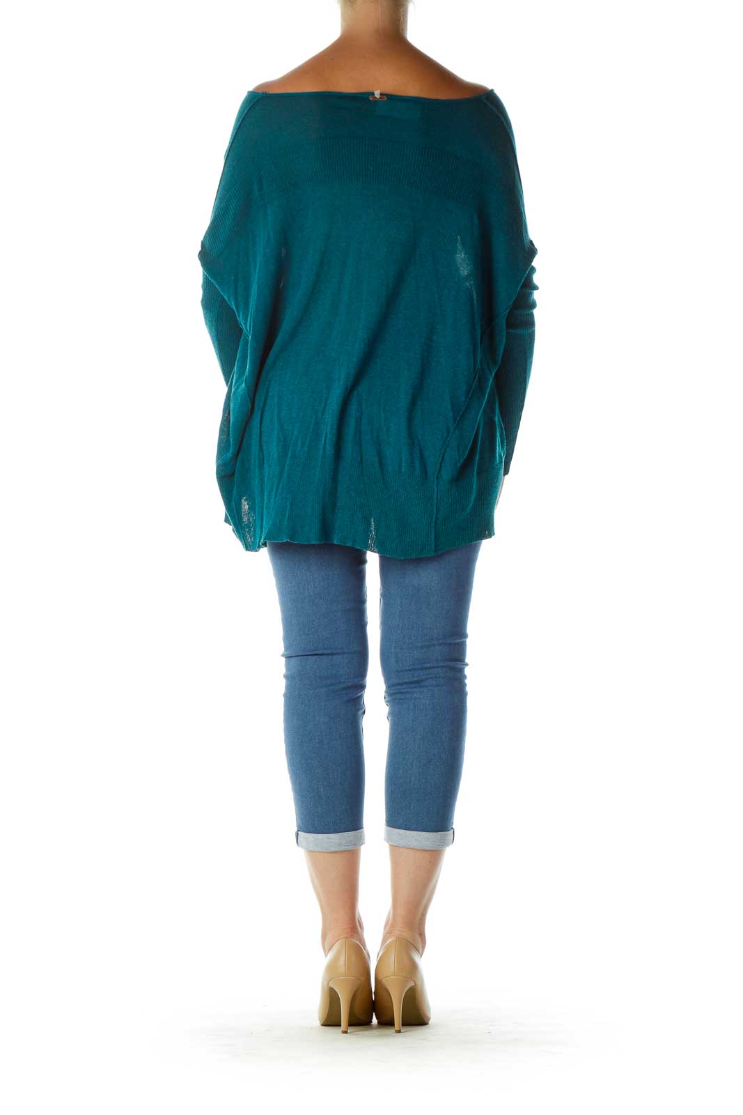 Back view of teal oversized V-neck knit sweater from Free People showing high-low hemline