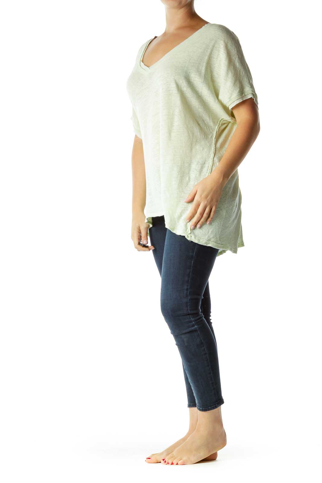 Front view of mint green oversized V-neck t-shirt from Free People