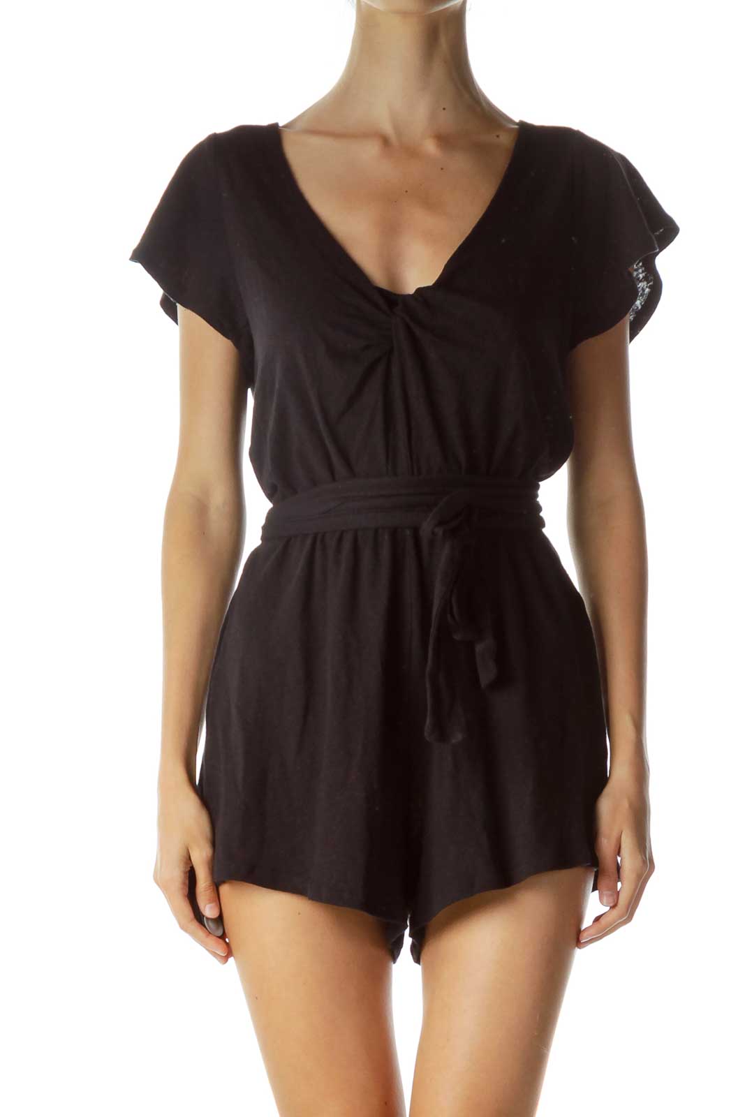 Front view of Free People black V-neck romper with tie waist