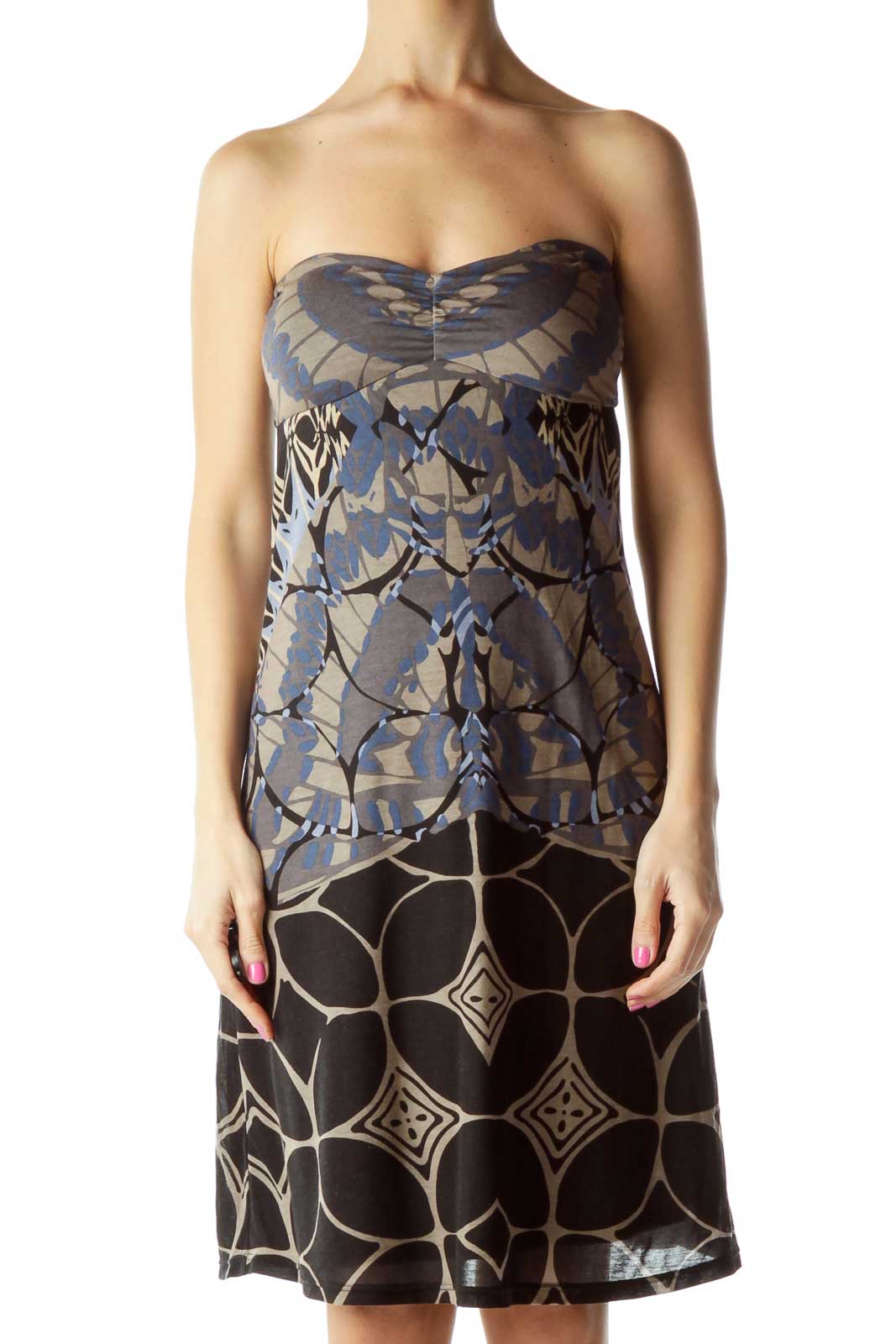 Front view of Free People strapless dress with blue geometric bodice and black circular skirt