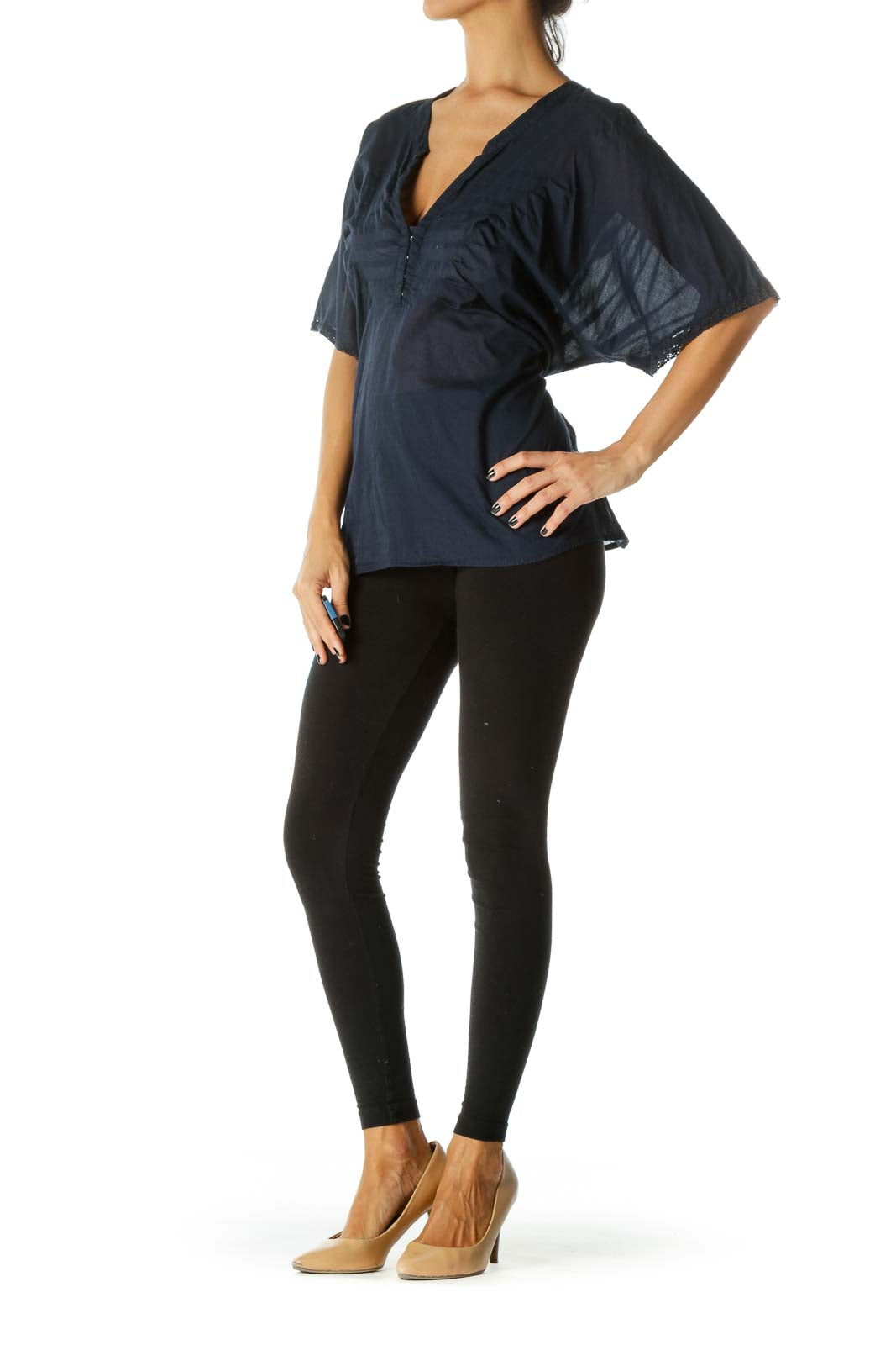 Front view of Free People navy blouse with lace-trimmed bell sleeves and V-neckline